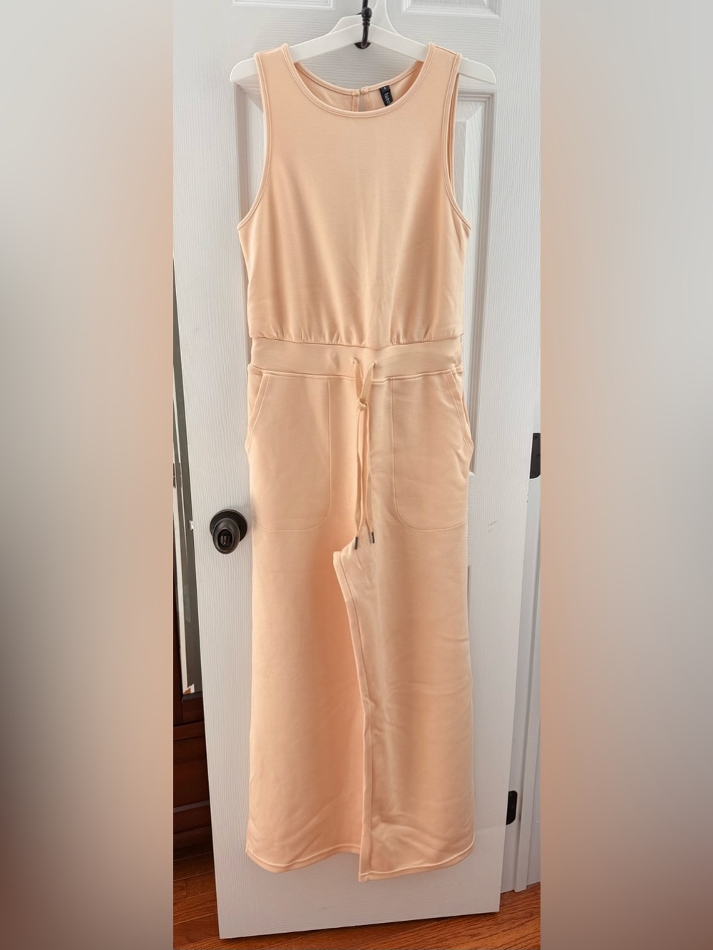 Women's Cream Colored Wide-Leg Jumpsuit with Pockets and Drawstring Waist